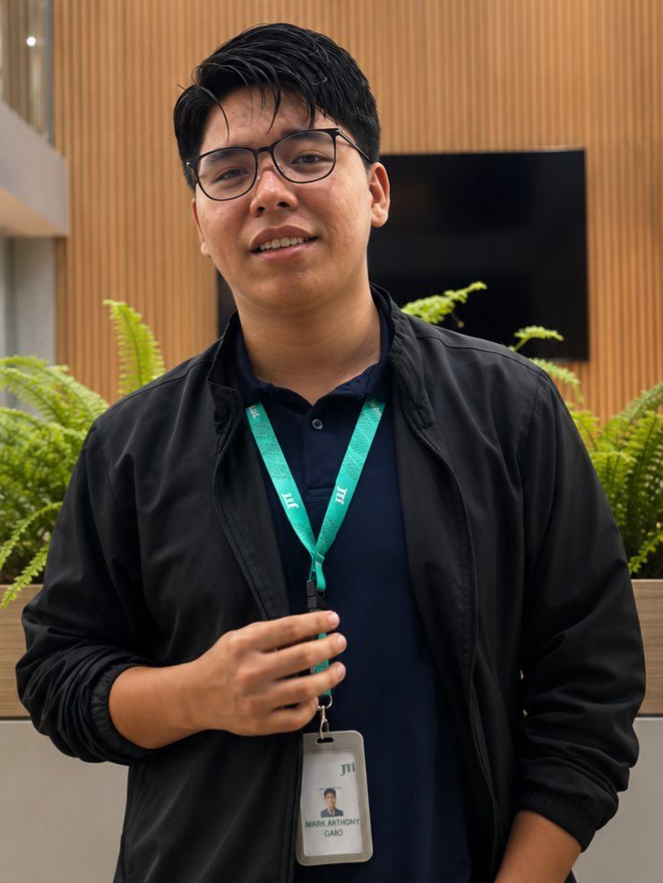 Mark Anthony Gabo at the office entrance