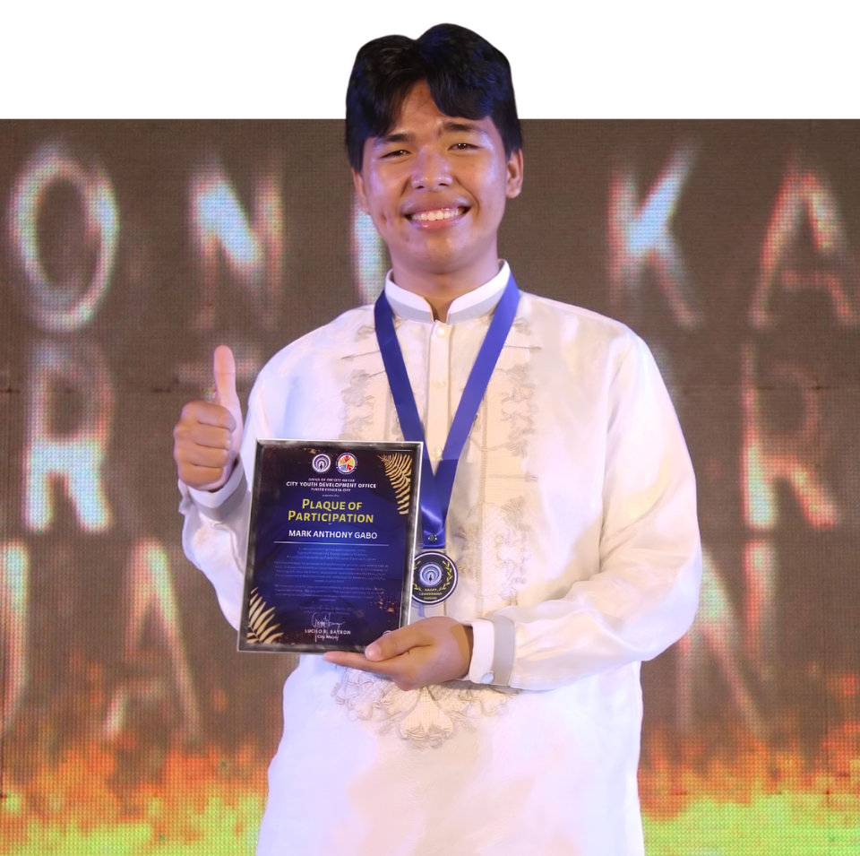 Mark Anthony Gabo receiving a leadership award in 2023